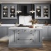 Dusk blue shaker kitchen from the Halesworth range. L-shape layout and kitchen island, with brass handles and white worktops