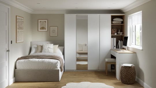 A gloss white bedroom with shelves and mirrored wardrobe door. The room has warm oak-style flooring and a matching dresser.