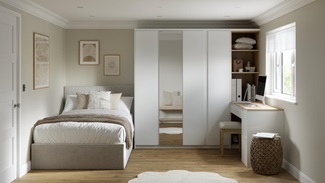 A gloss white bedroom with shelves and mirrored wardrobe door. The room has warm oak-style flooring and a matching dresser.
