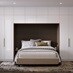 A bedroom with slab, white cabinets in a gloss finish. There is a drawer desser and tall units alongside and above a bed.