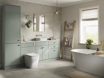 A reed green bathroom with a gloss finish and brass handles. It has contemporary stone-effect flooring and wall tiles.