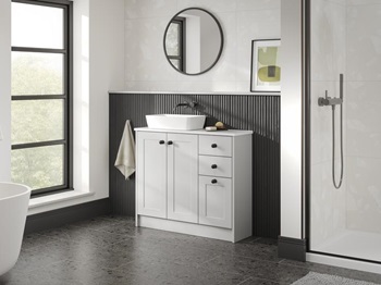 A single-wall, shaker bathroom in a dove grey tone. It has tile flooring, a ceramic sink, and dark oak wall panelling.