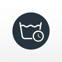 Black and white illustration of a washing machine with water and a timer.